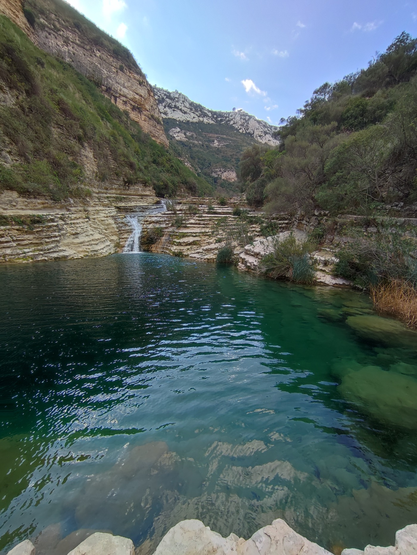 Emerald natural pools of Cava Grande del Cassibile near Syracuse, Sicily