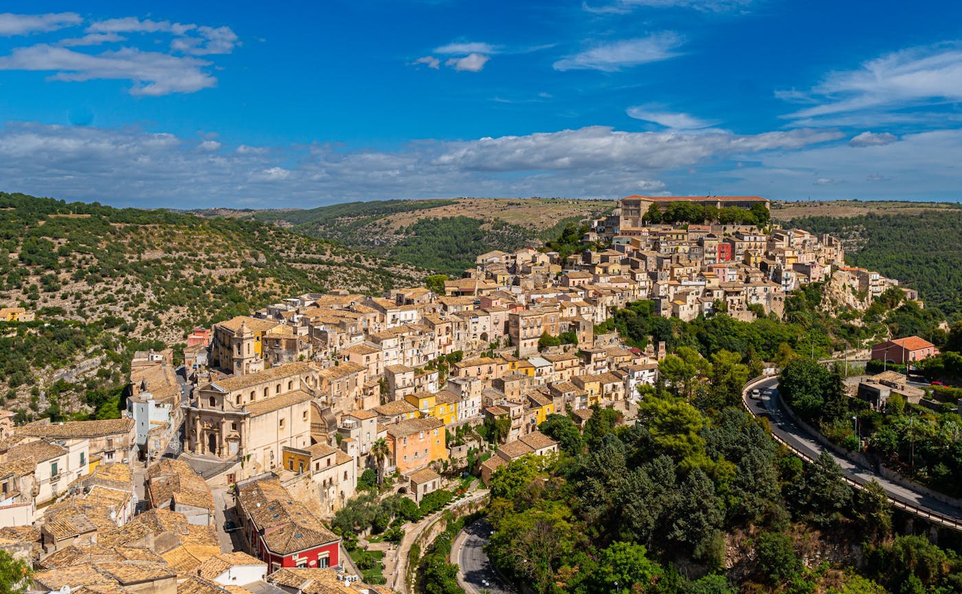 Aerial view of the hilltop town of Ragusa Ibla with its dense Baroque architecture and winding streets
