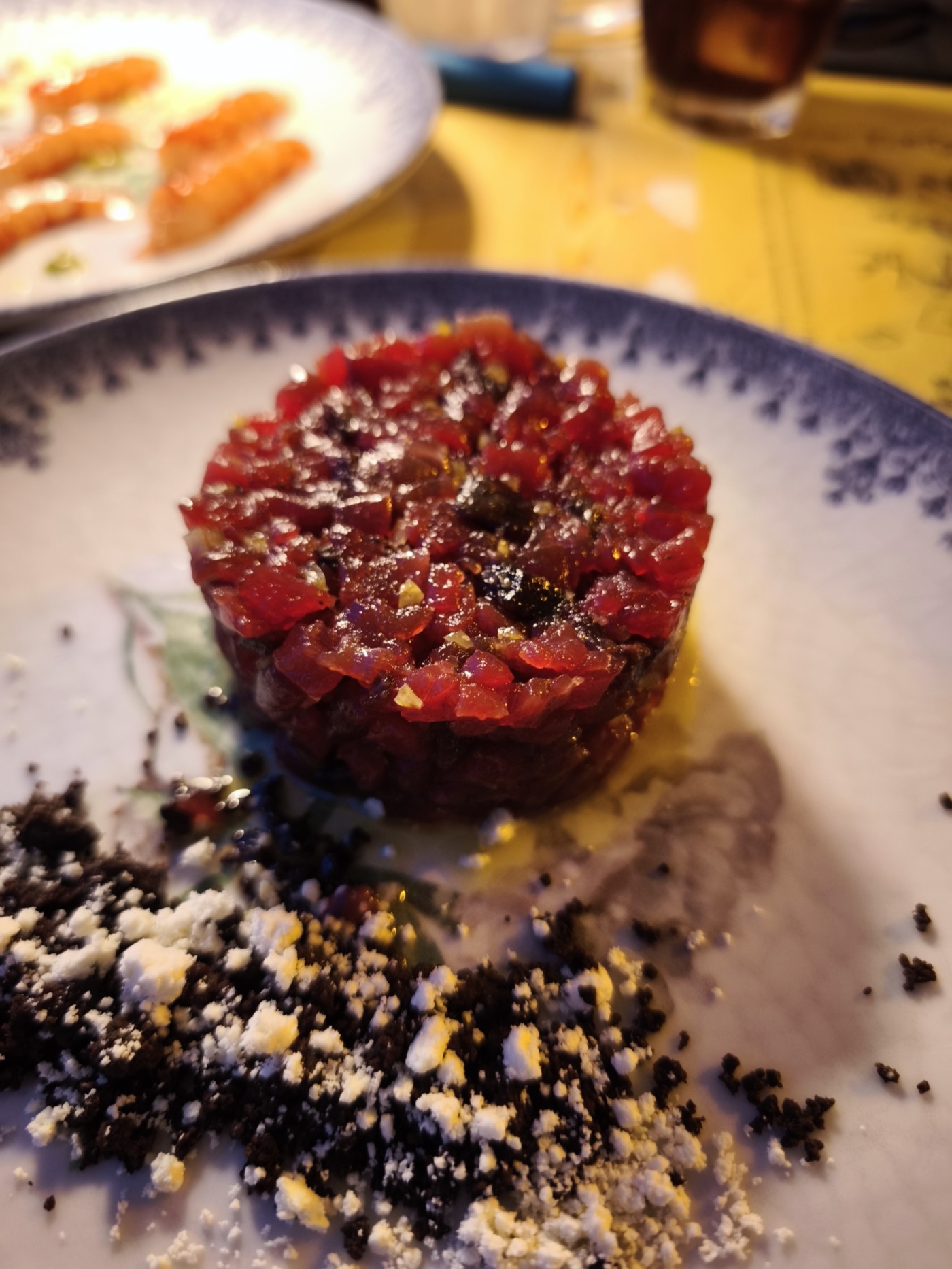 Tuna tartare with olive crumble served at a Noto restaurant